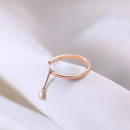 Anillo de cadena con borlas ajustable y sencillo